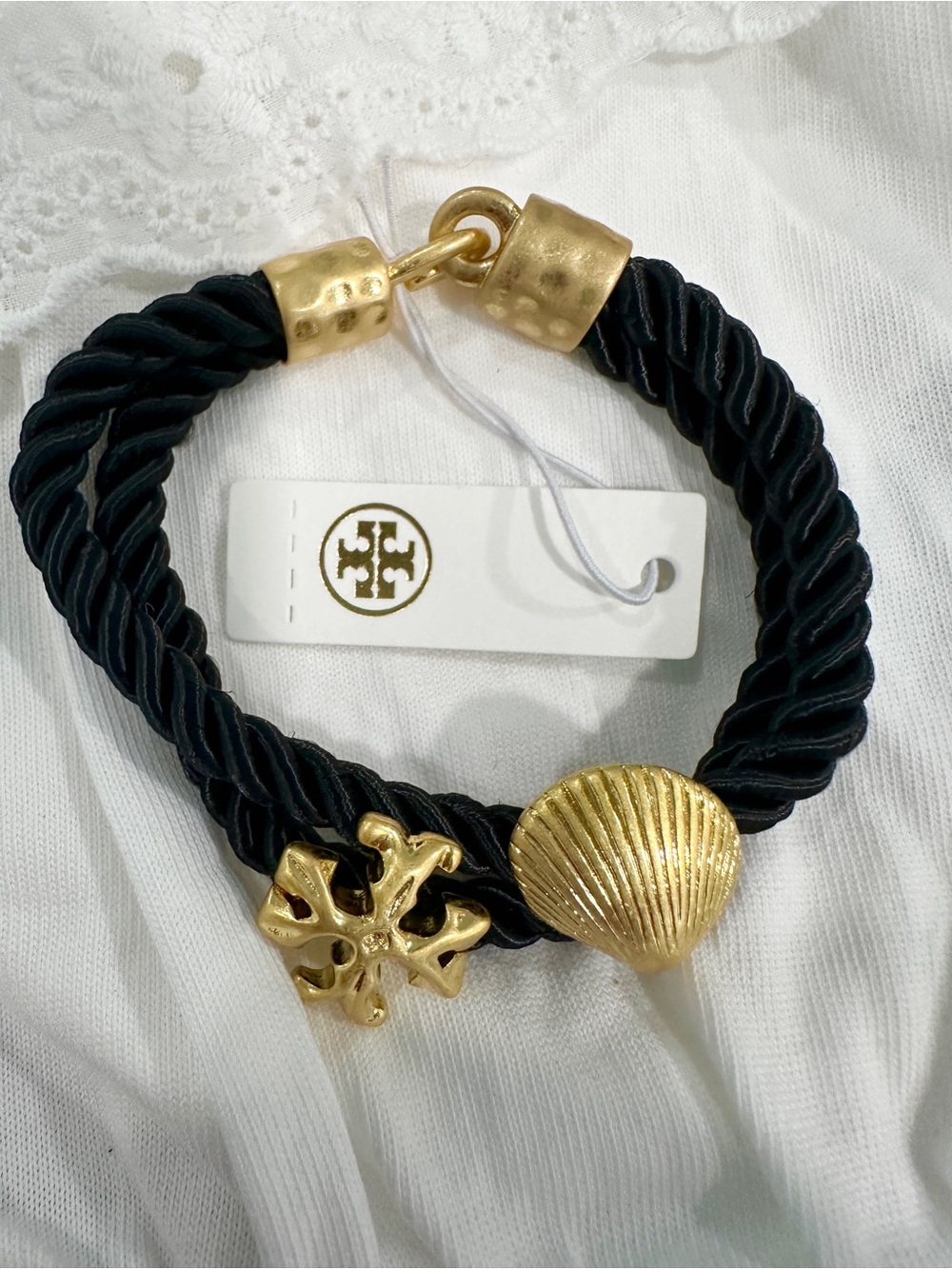 Tory Burch Black Rope Bracelet with Gold Shell and Logo Charms